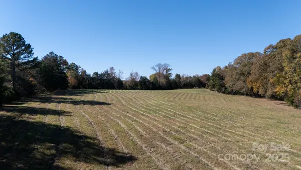 a view of a backyard of the house