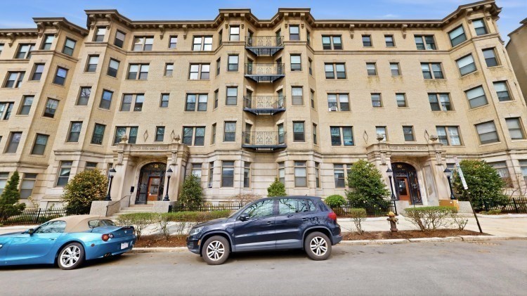 56 Charlesgate East, Unit 138 Boston, MA 02215 - Photo 9 of 17 a car parked in front of a building