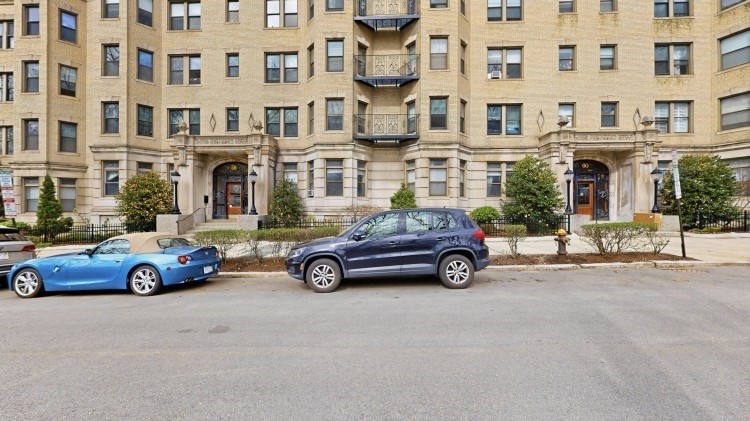 56 Charlesgate East, Unit 138 Boston, MA 02215 - Photo 10 of 17 a car parked in front of a building