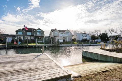 a view of residential houses with outdoor space