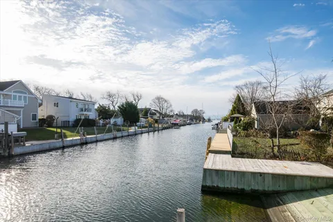 a view of swimming pool with a lake view