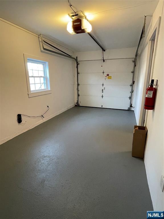 52 Reilly Court, Unit 1 Hackensack, NJ 07601 - Photo 22 of 25 en empty room with windows