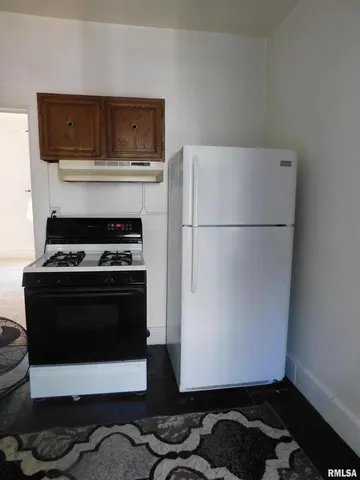 a storage room with washer and dryer