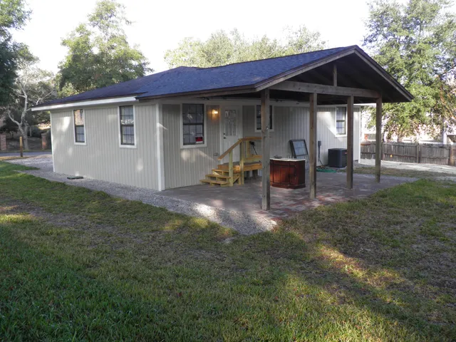 a front view of a building with a street