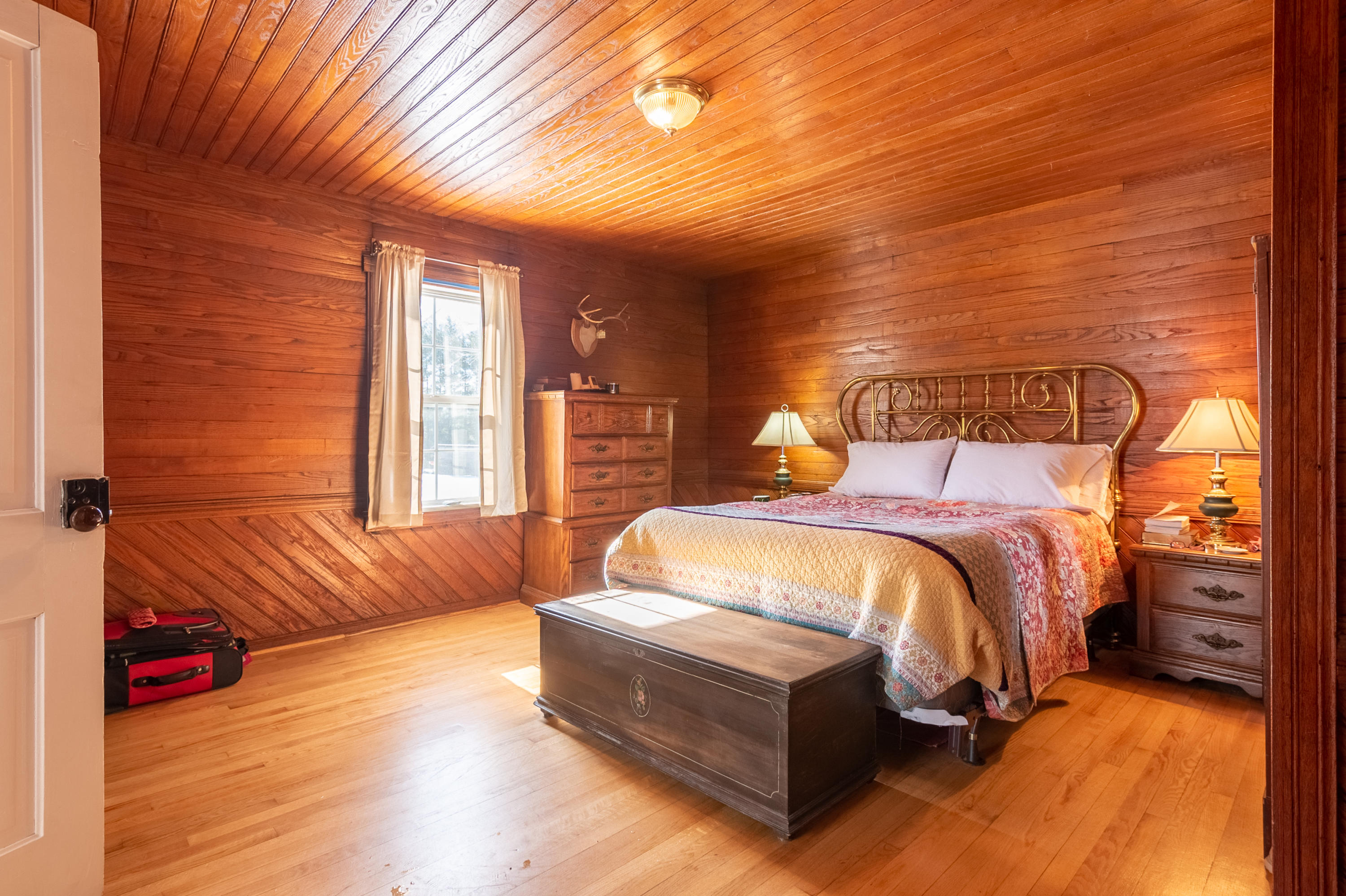 1696 Conner Grove Road Southwest Willis, VA 24380 - Photo 22 of 41 a bedroom with a bed and wooden floor