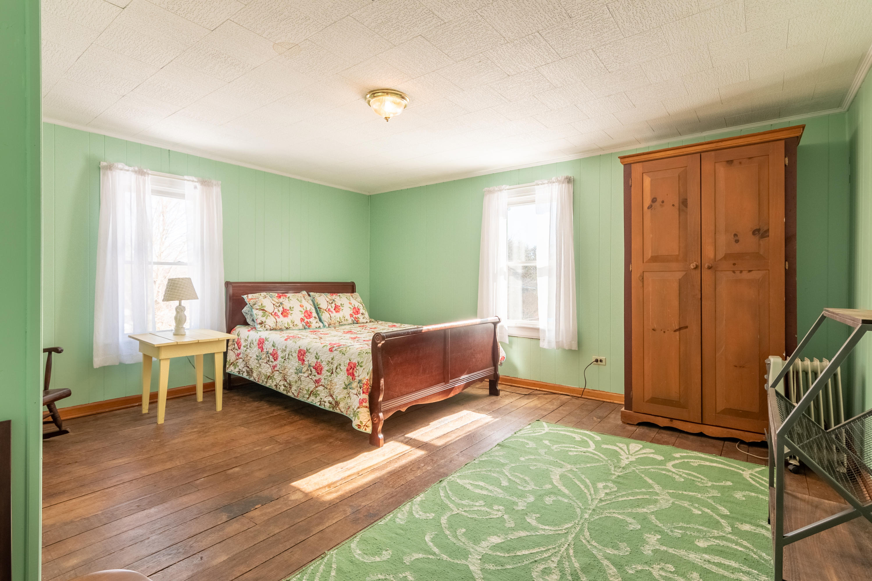 1696 Conner Grove Road Southwest Willis, VA 24380 - Photo 29 of 41 a bedroom with a bed and a window