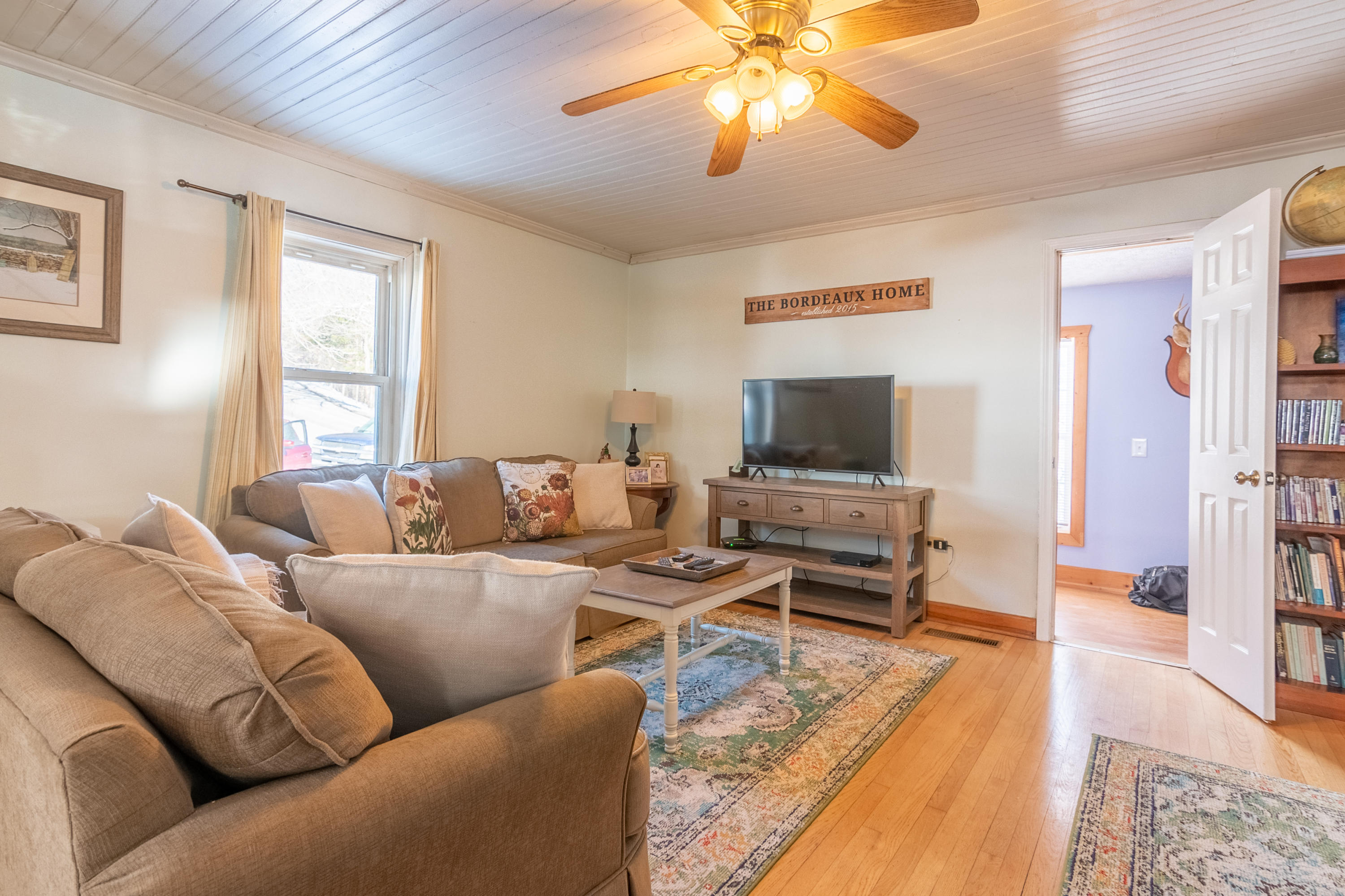1696 Conner Grove Road Southwest Willis, VA 24380 - Photo 5 of 41 a living room with furniture and a flat screen tv