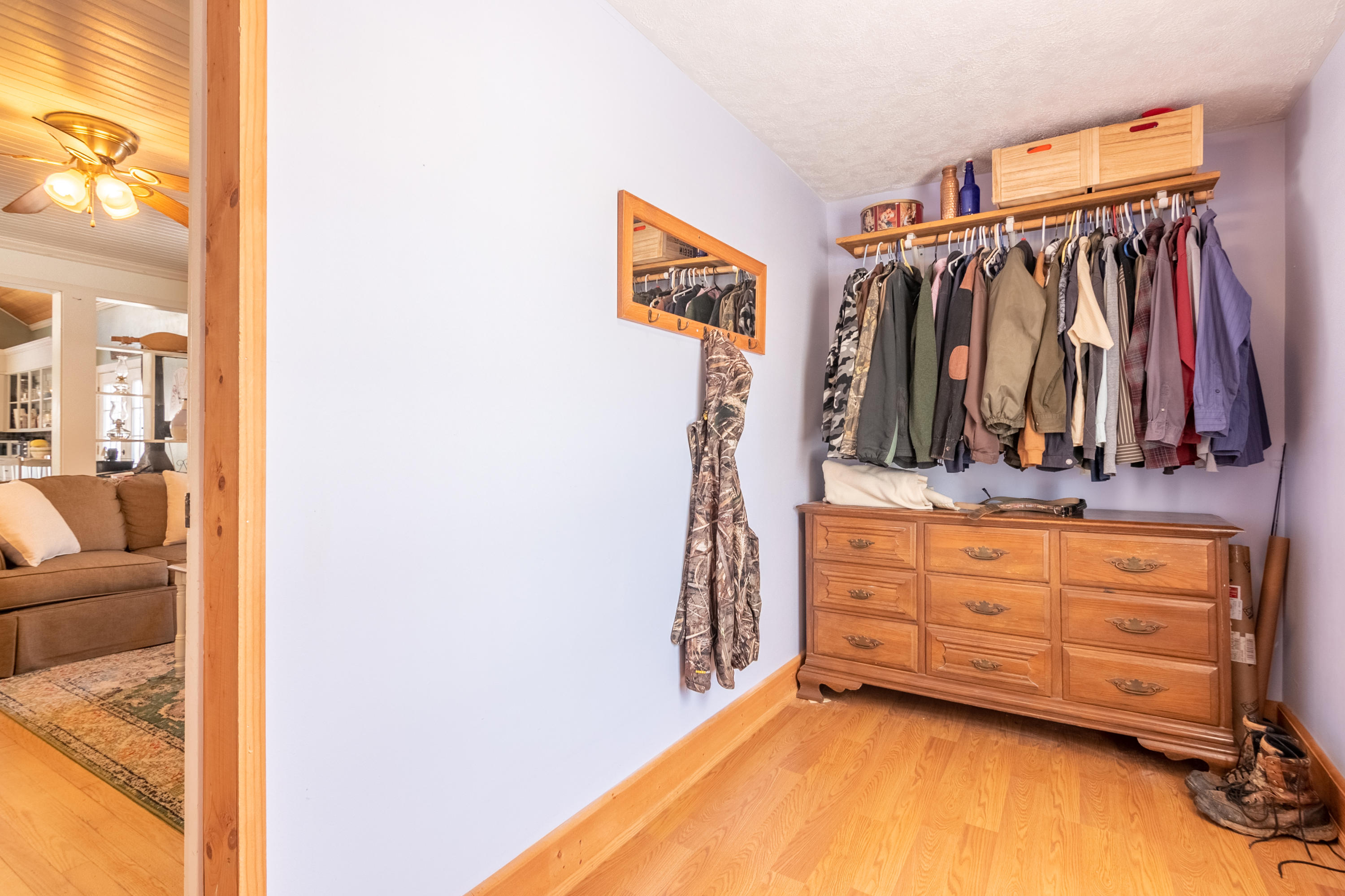 1696 Conner Grove Road Southwest Willis, VA 24380 - Photo 8 of 41 a view of walk in closet with clothes and shoes