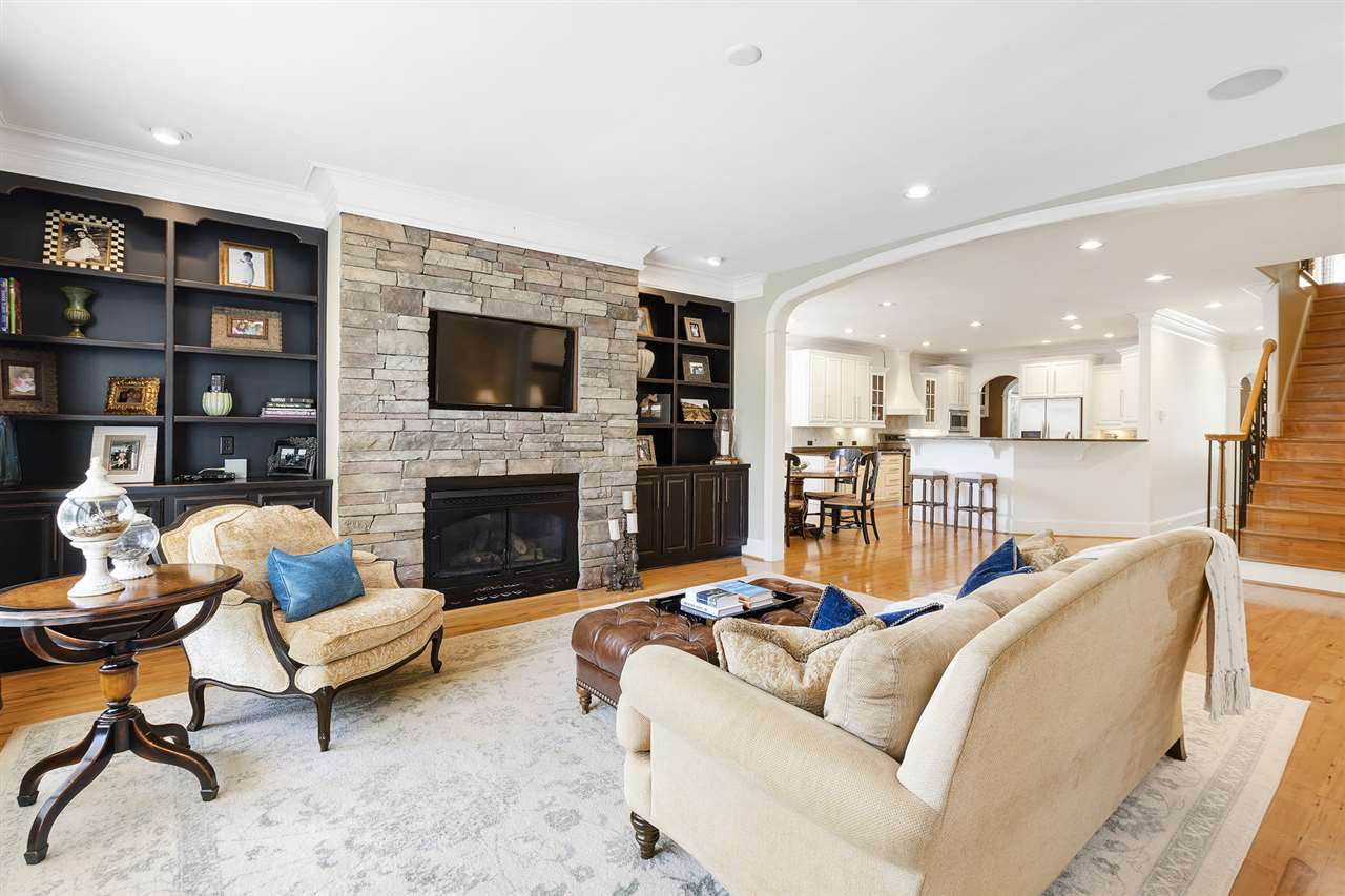 1806 10th Avenue Raleigh, NC 27607 - Photo 30 of 30 Fireplace and built-ins appeal to the cozy side of this open floor plan Fireplace