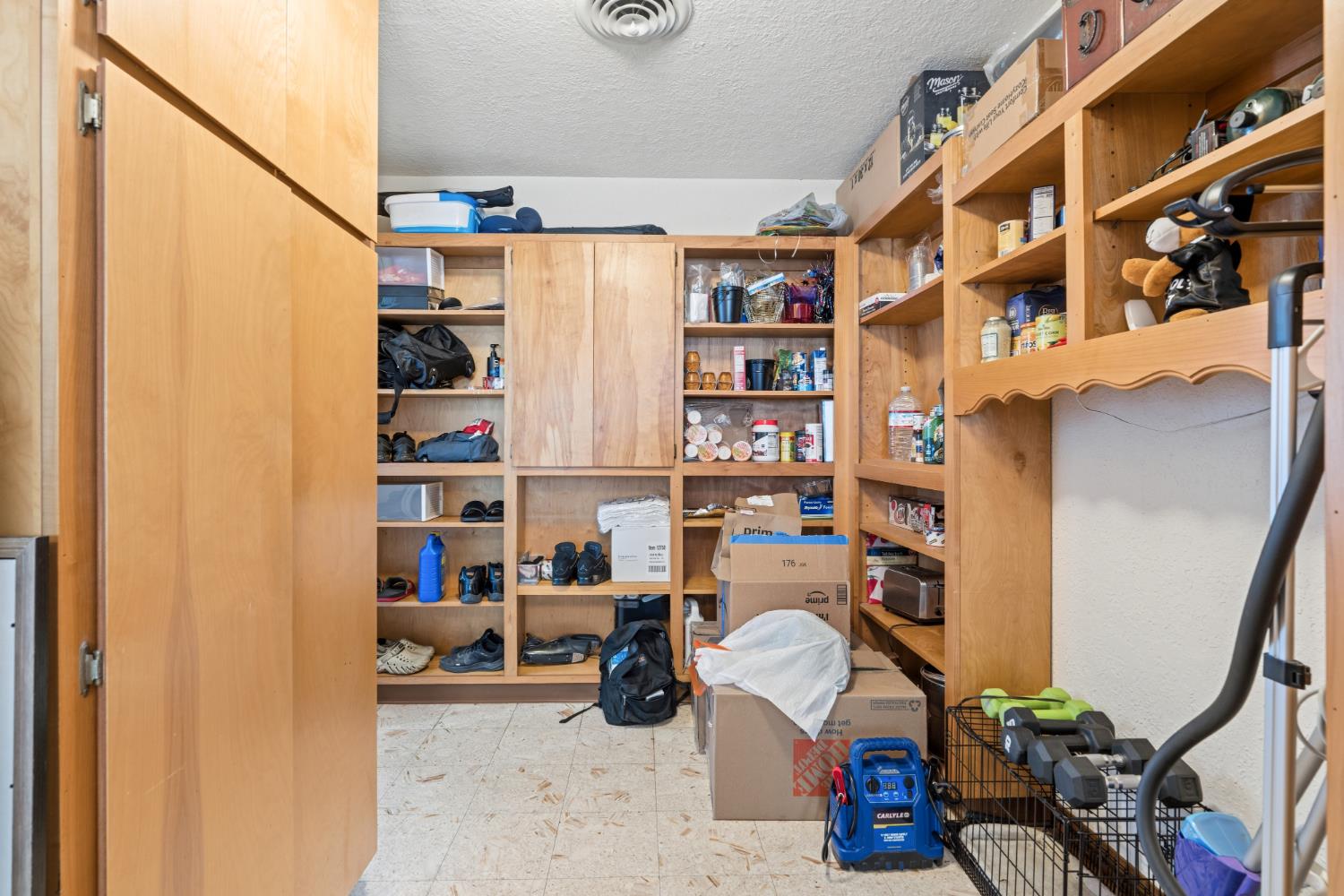 231 South Austin Road Manteca, CA 95336 - Photo 24 of 39 Laundry room with extra space & storage.