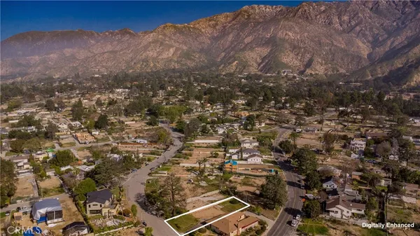 an aerial view of residential house with parking space