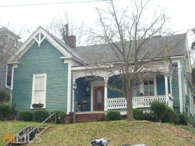 308 East 2nd Street Rome, GA 30161 - Photo 1 of 1 a front view of a house with garden