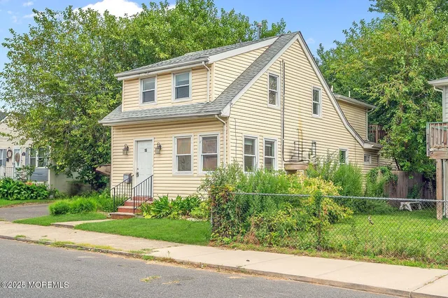 front view of house with a yard
