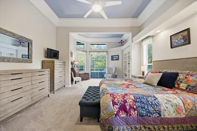 a spacious bathroom with a tub sink and mirror