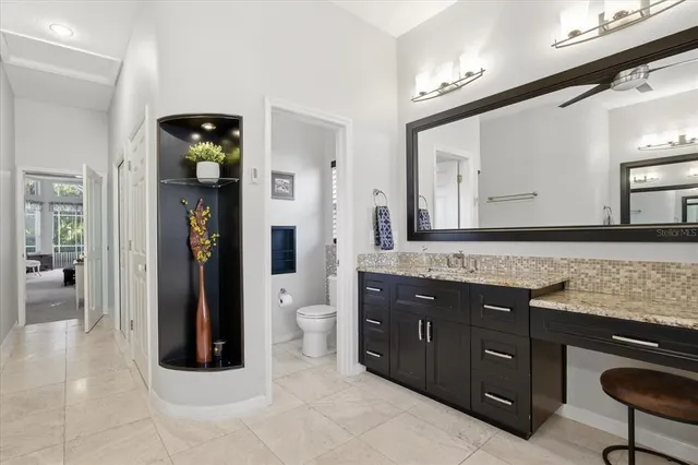 a view of storage and utility room with wooden floor