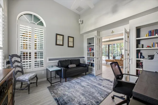 a kitchen with stainless steel appliances kitchen island granite countertop a stove and a refrigerator