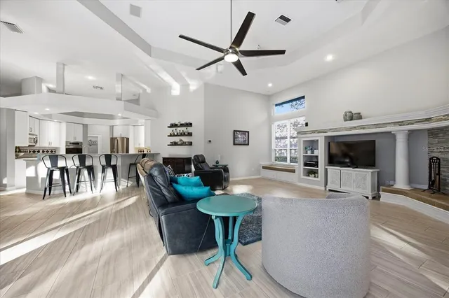 a view of a house with a yard porch and sitting area