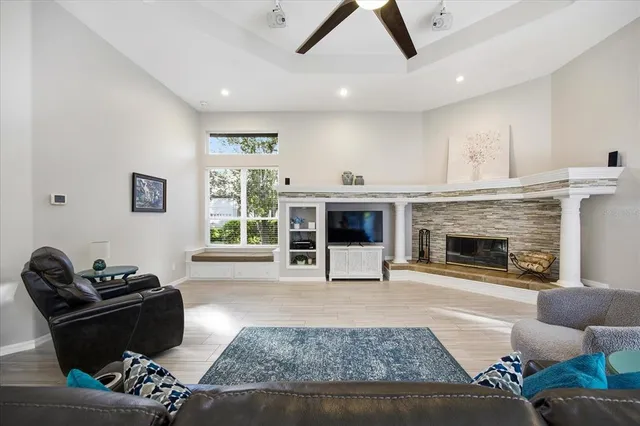 a view of a backyard with large trees