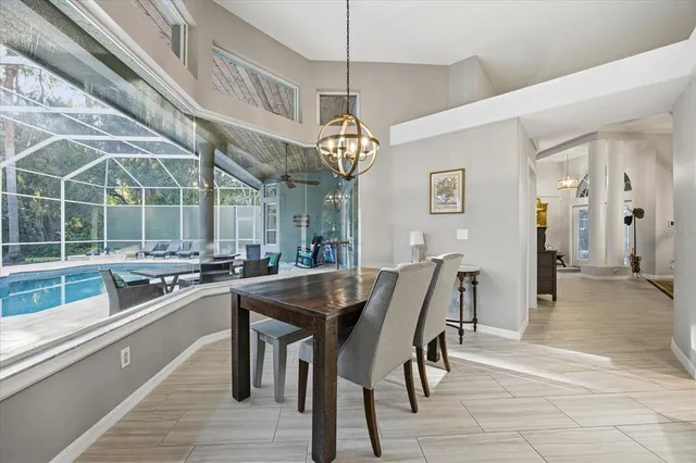 a view of a swimming pool with a patio