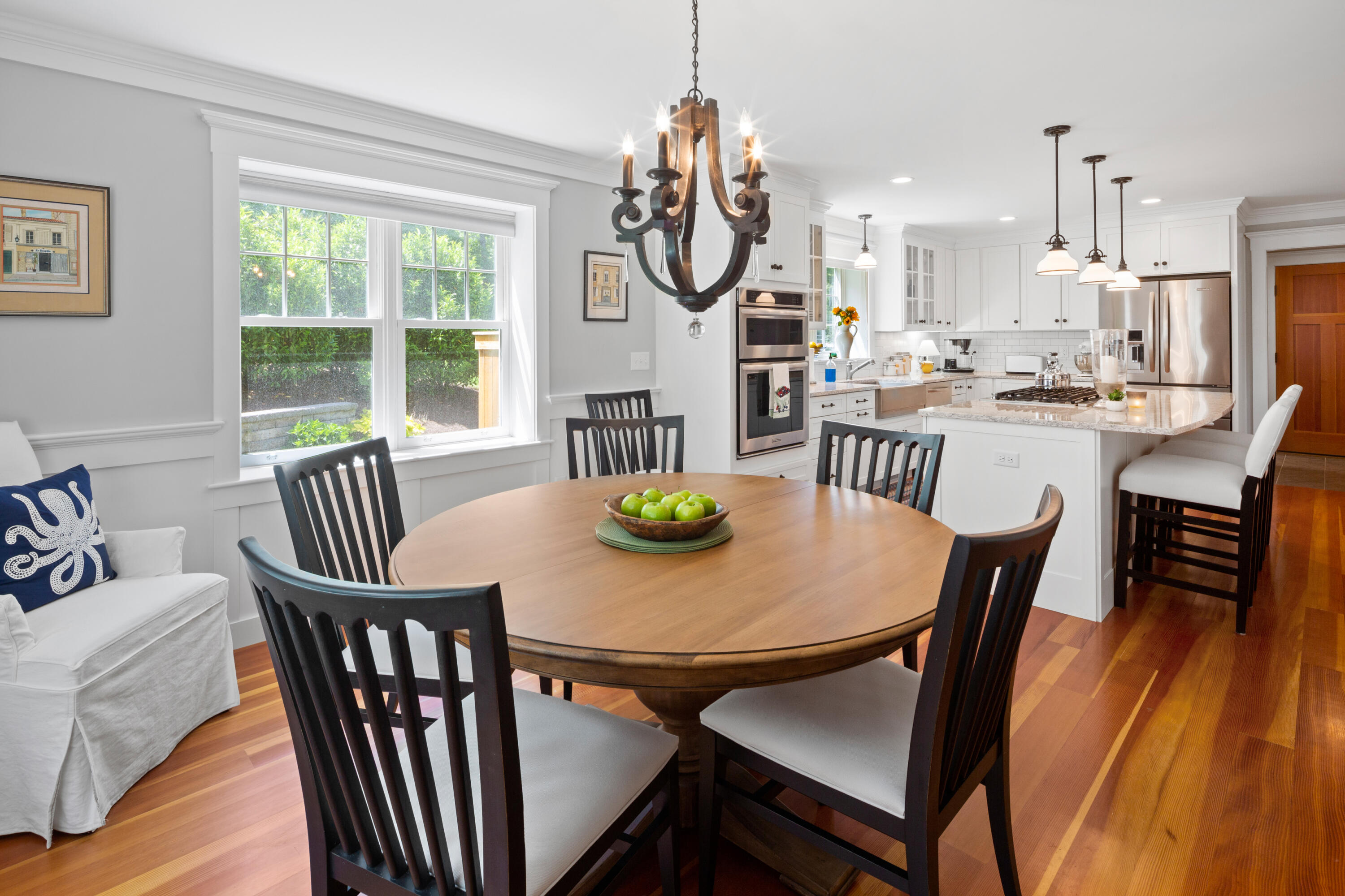 91 Pochet Road Orleans, MA 02653 - Photo 43 of 77 a view of a dining room with furniture window and wooden floor