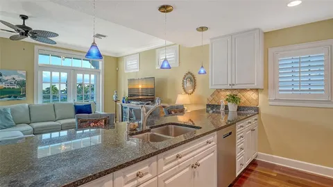 a view of a balcony with wooden floor