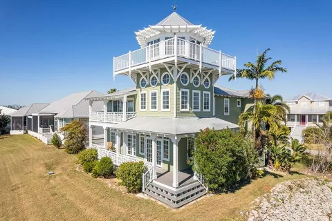 a view of an entryway with wooden floor and windows