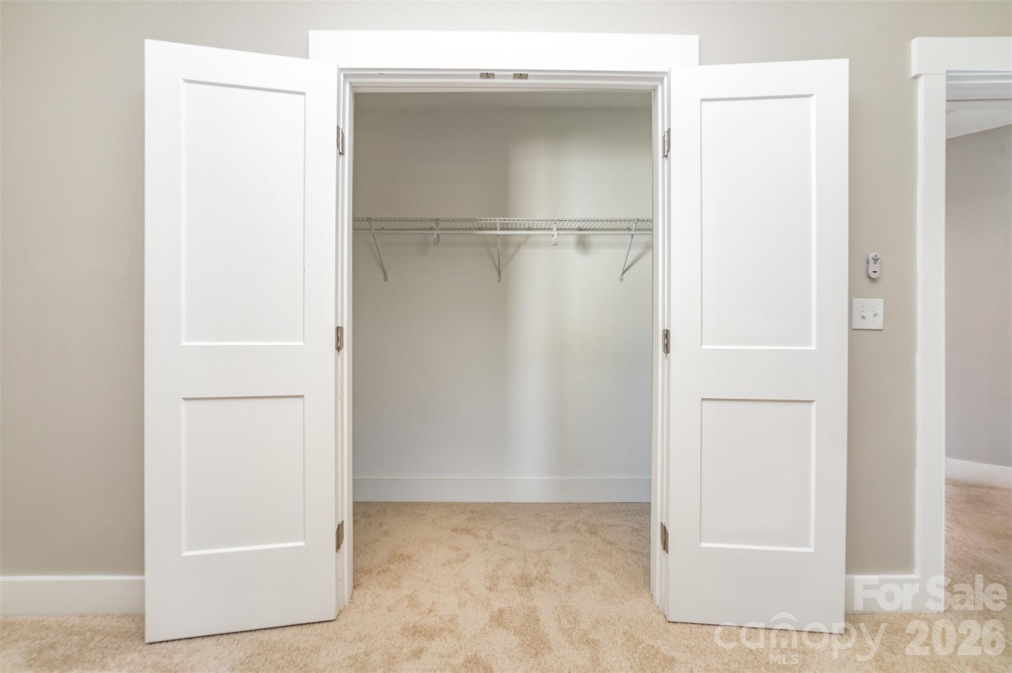 1003 Hunter Valley Road Shelby, NC 28150 - Photo 16 of 23 a view of walk in closet with empty racks