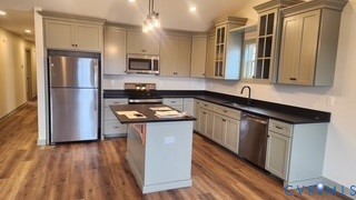 203 Zion Drive Farmville, VA 23901 - Photo 4 of 20 a kitchen with stainless steel appliances granite countertop a sink stove and refrigerator