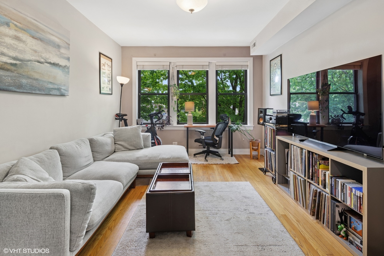 2709 West Altgeld Street, Unit 2 Chicago, IL 60647 - Photo 3 of 13 a living room with furniture couch and a large window