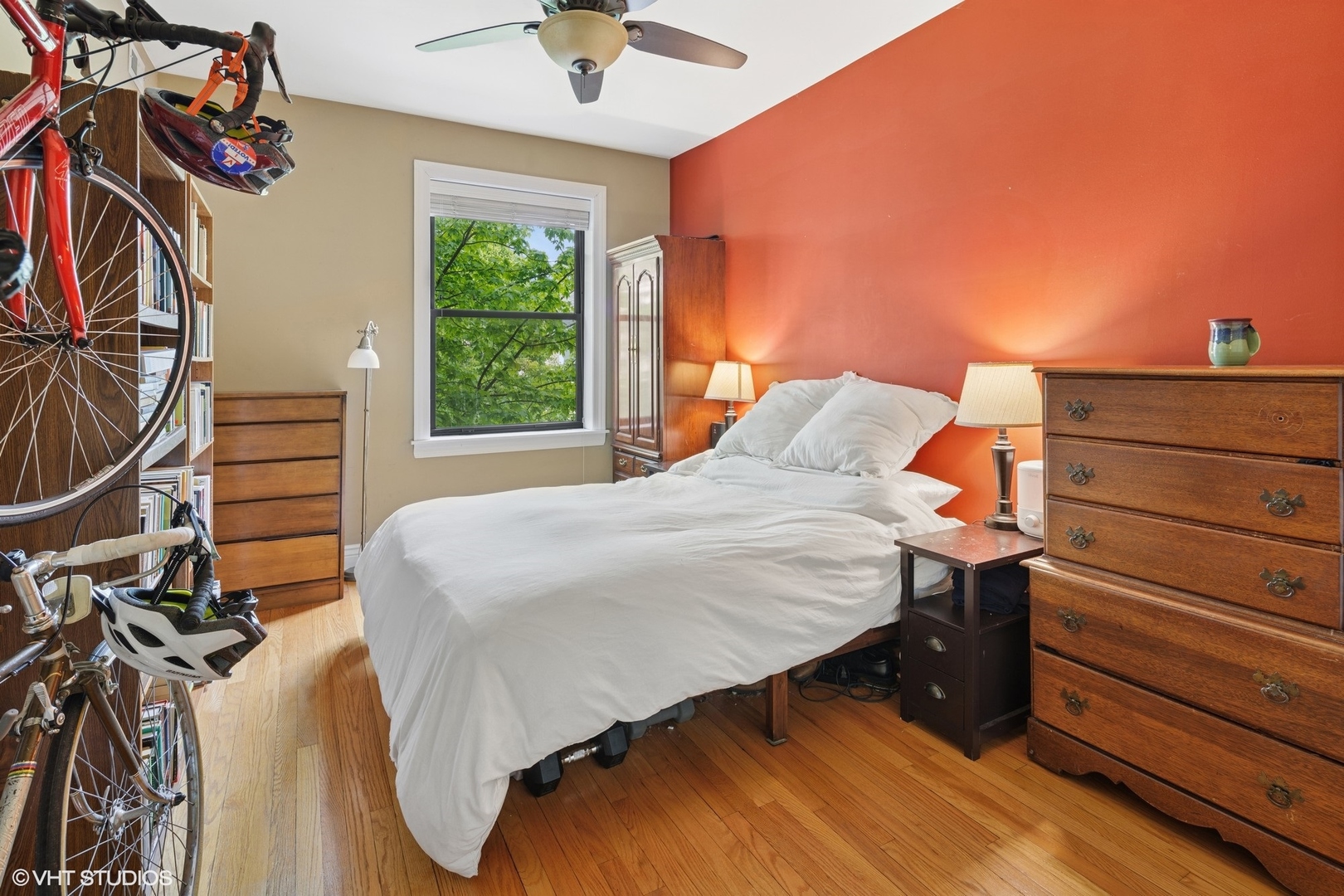 2709 West Altgeld Street, Unit 2 Chicago, IL 60647 - Photo 9 of 13 a bedroom with a bed and a chandelier