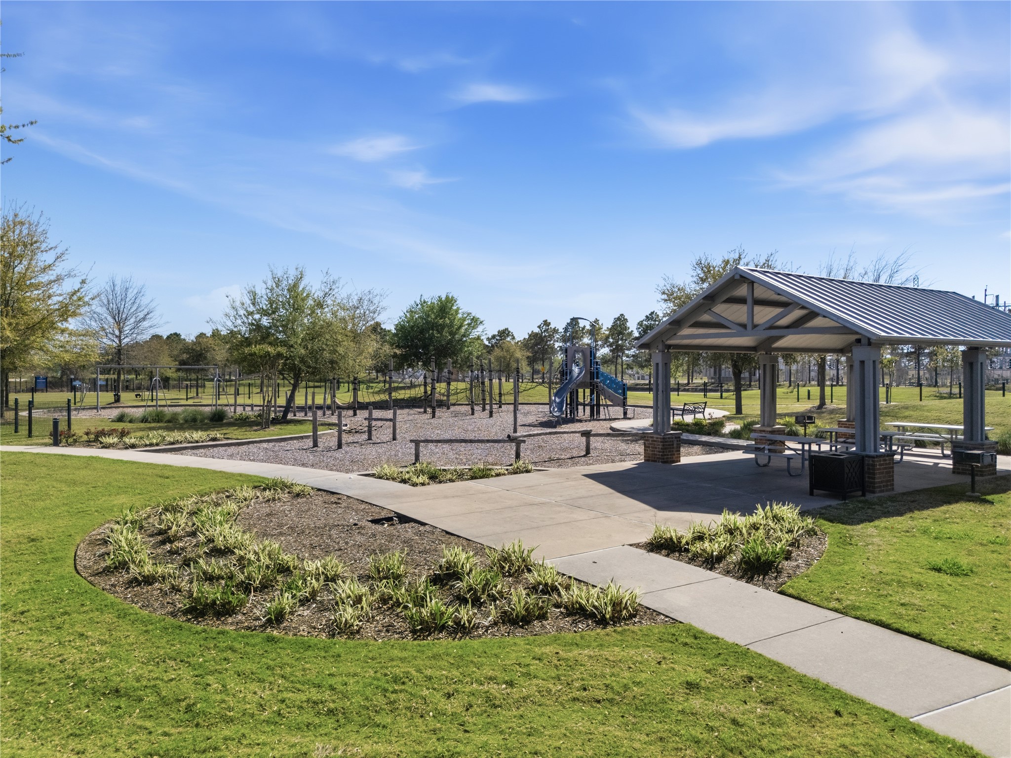 416 Bartlett Street Webster, TX 77598 - Photo 47 of 49 Community park with covered pavilion, playground, and walking paths
