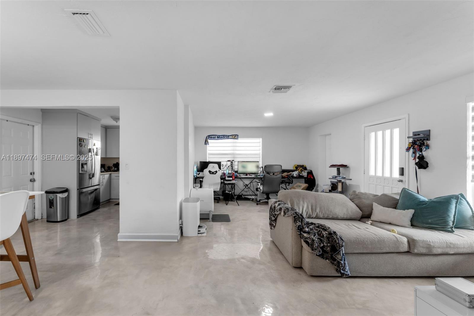 8811 Southwest 128th Street Miami, FL 33176 - Photo 12 of 28 a living room with furniture and a window