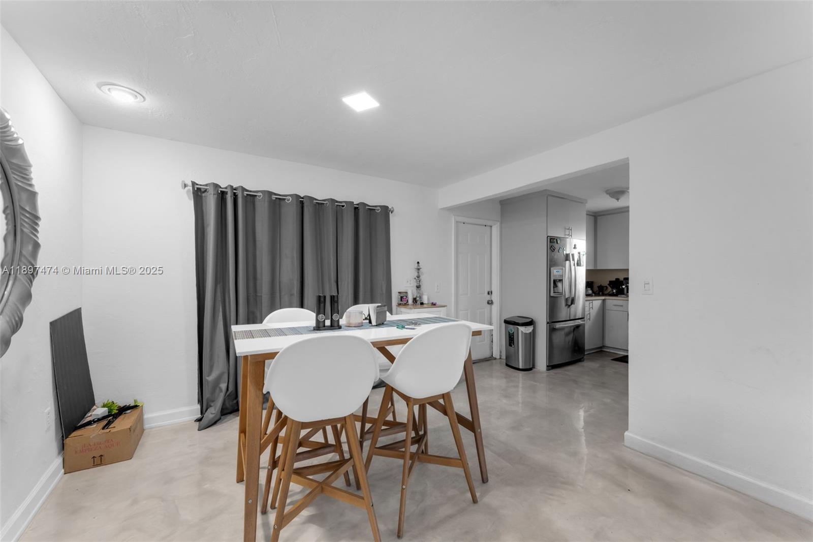 8811 Southwest 128th Street Miami, FL 33176 - Photo 13 of 28 a dining room with furniture and window