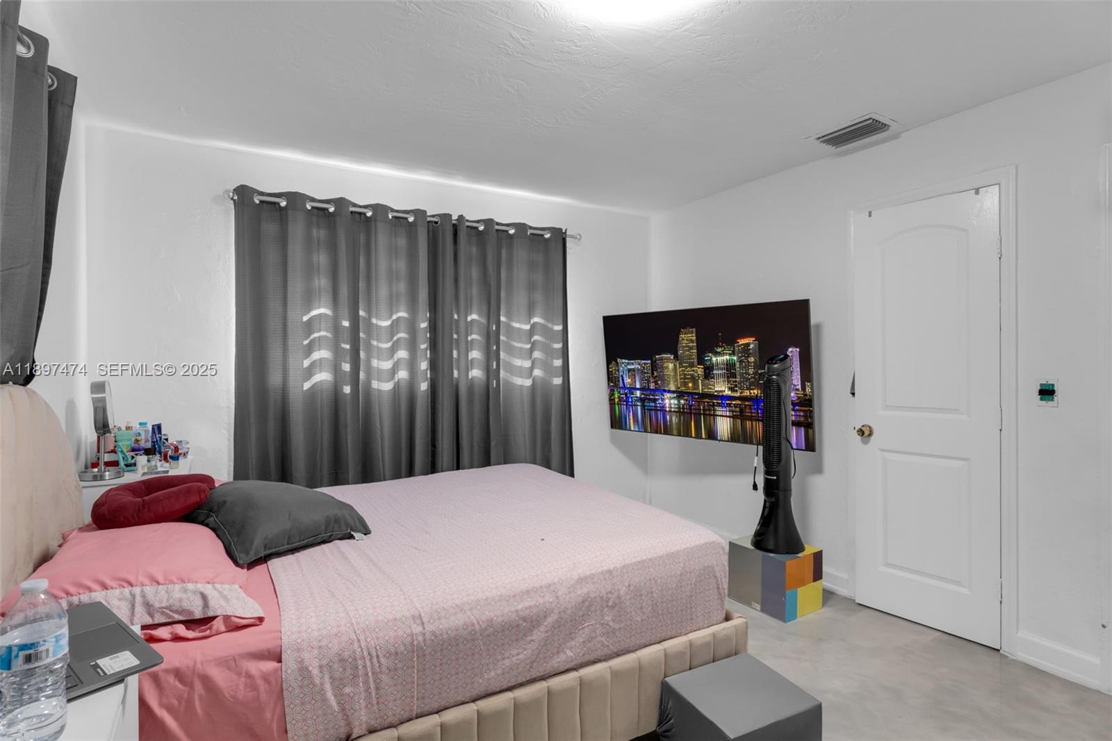 8811 Southwest 128th Street Miami, FL 33176 - Photo 18 of 28 a bedroom with a bed and a window
