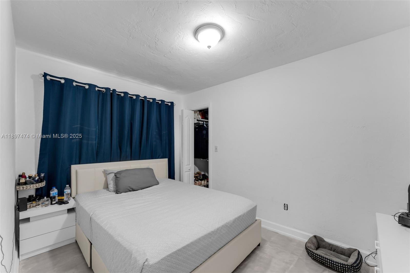 8811 Southwest 128th Street Miami, FL 33176 - Photo 20 of 28 a bedroom with a bed and a dresser