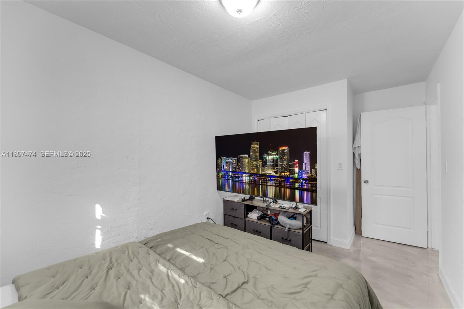 8811 Southwest 128th Street Miami, FL 33176 - Photo 24 of 28 a bedroom with a bed and window