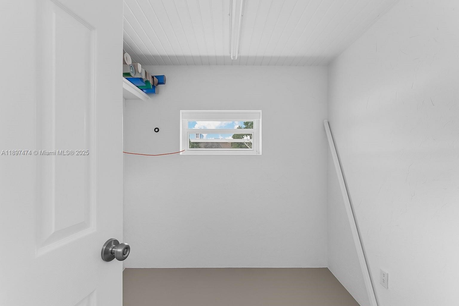 8811 Southwest 128th Street Miami, FL 33176 - Photo 26 of 28 a view of hallway with window