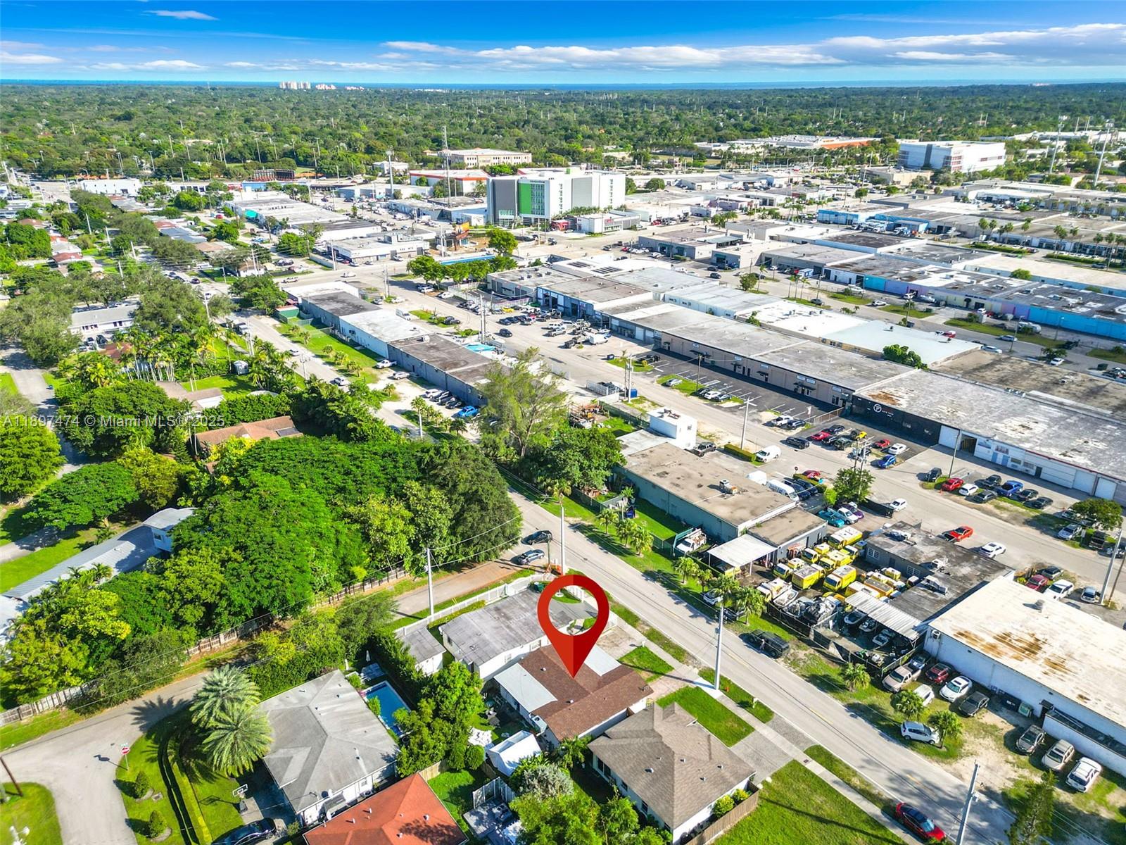 8811 Southwest 128th Street Miami, FL 33176 - Photo 6 of 28 an aerial view of residential houses with outdoor space