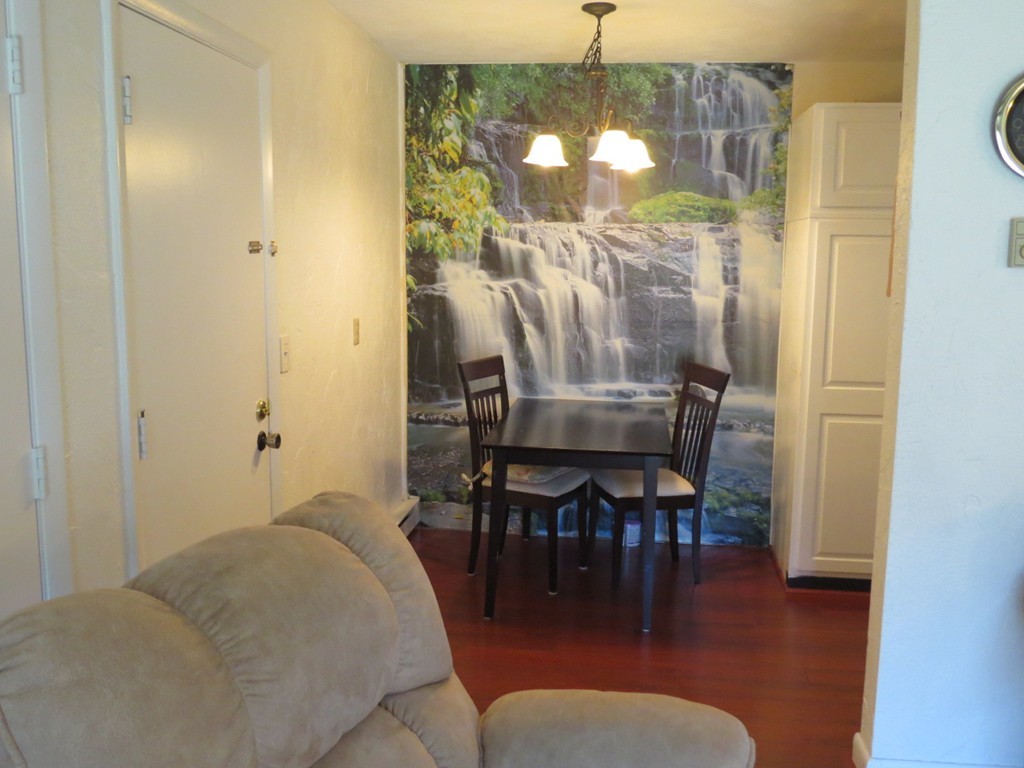 188 Swanson Road, Unit 336 Boxborough, MA 01719 - Photo 5 of 19 a balcony with table and chairs