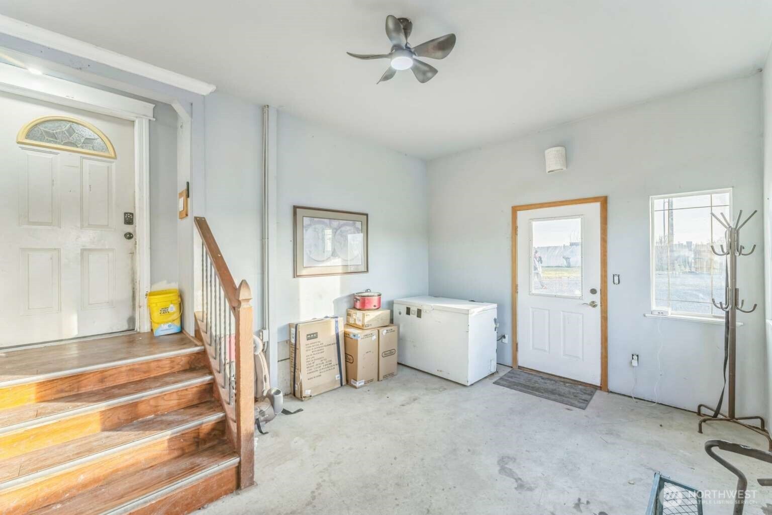 10068 Idano Road Northeast Moses Lake, WA 98837 - Photo 15 of 40 a view of livingroom with furniture and stairs