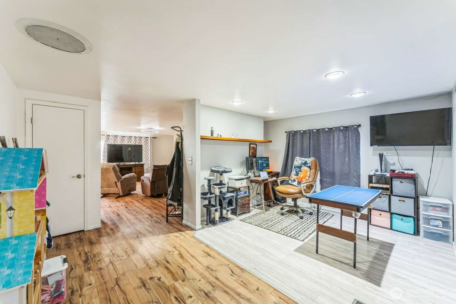 10068 Idano Road Northeast Moses Lake, WA 98837 - Photo 34 of 40 a bed room with a bed and a flat screen tv