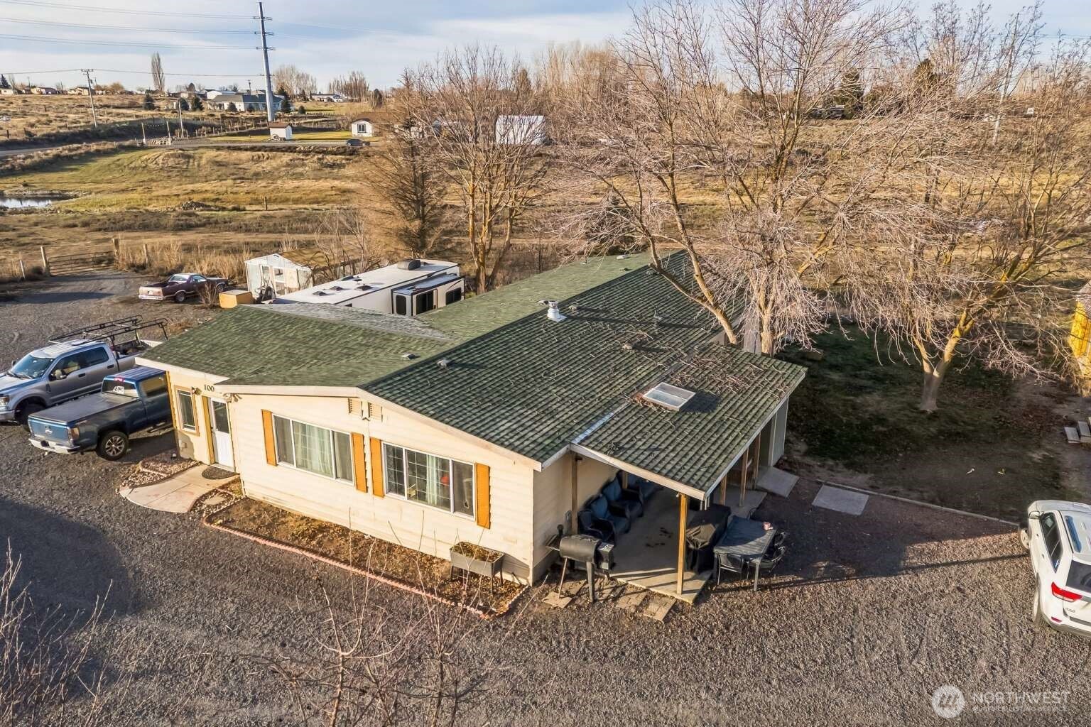 10068 Idano Road Northeast Moses Lake, WA 98837 - Photo 9 of 40 an aerial view of a house with a lake view