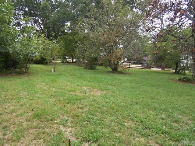 1402 Brooks Avenue Raleigh, NC 27608 - Photo 3 of 12 a huge green field with lots of trees