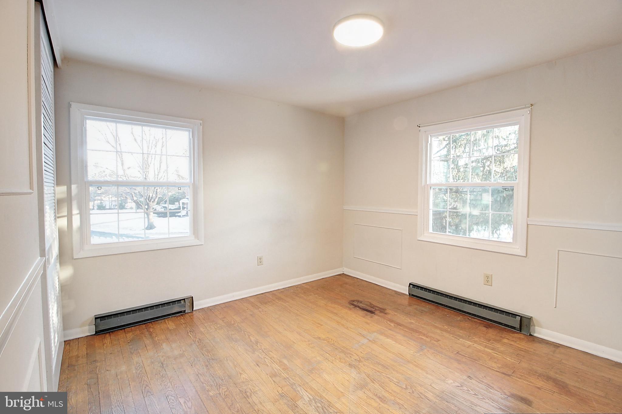1411 West 12th Street Frederick, MD 21702 - Photo 6 of 16 an empty room with a window