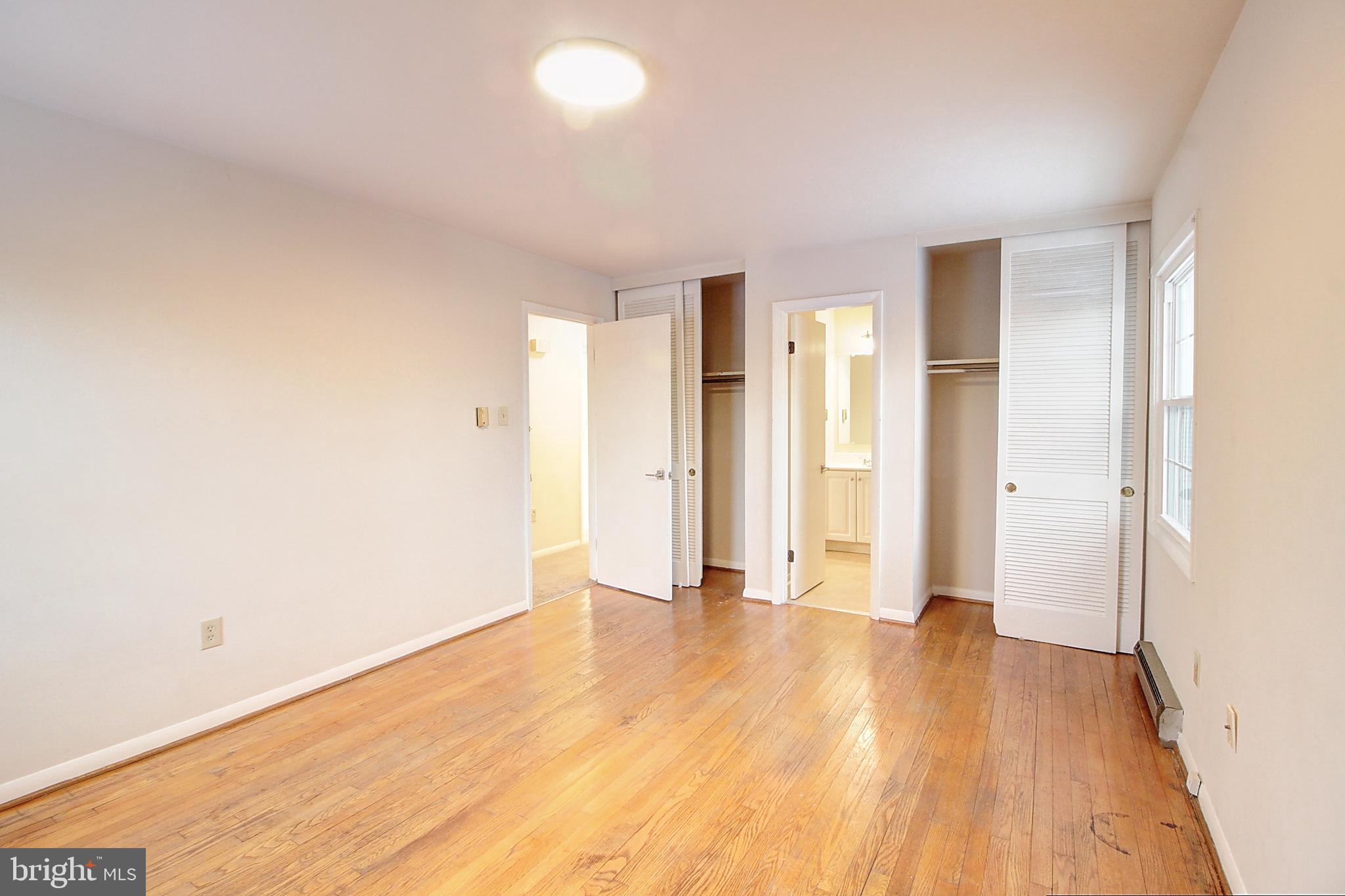 1411 West 12th Street Frederick, MD 21702 - Photo 9 of 16 a view of an empty room and wooden floor