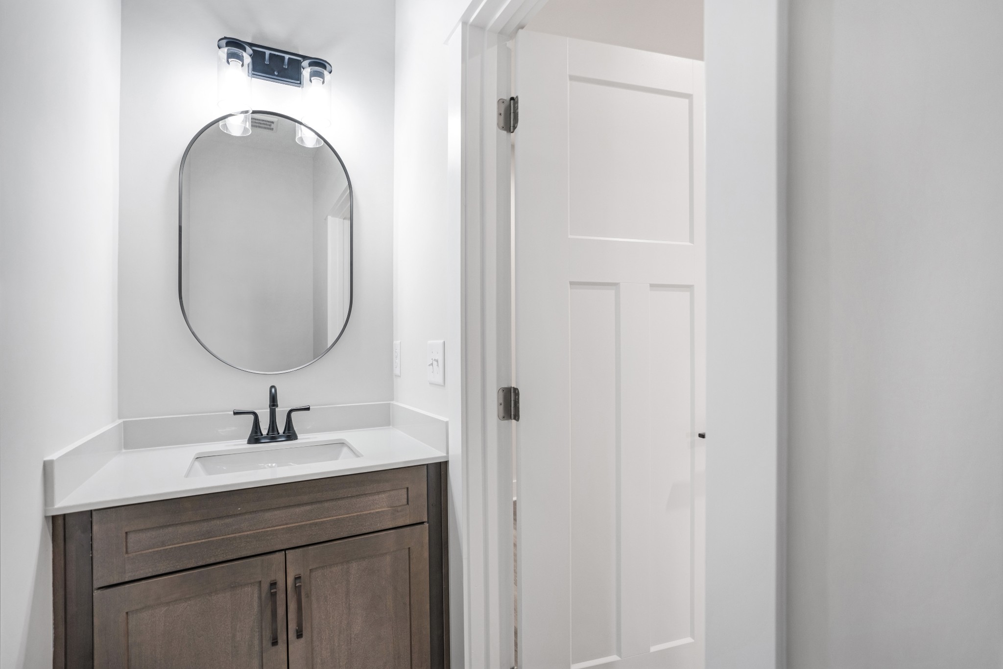 2615 Cooper Creek Road Woodlawn, TN 37191 - Photo 17 of 30 a bathroom with a sink and a mirror