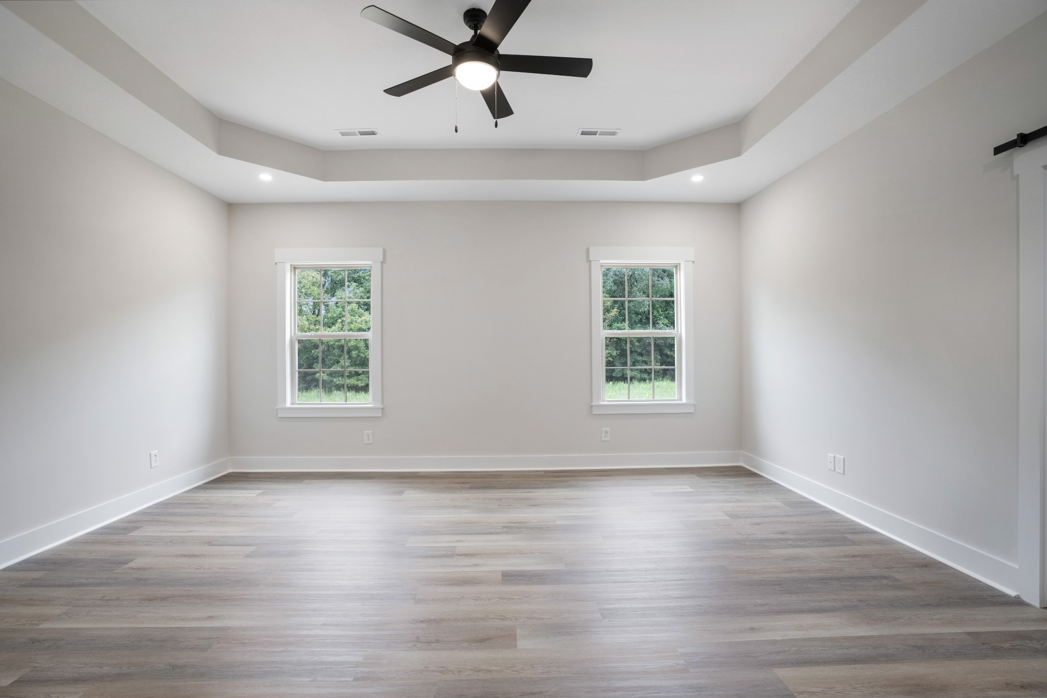 2615 Cooper Creek Road Woodlawn, TN 37191 - Photo 18 of 30 wooden floor in an empty room with a window