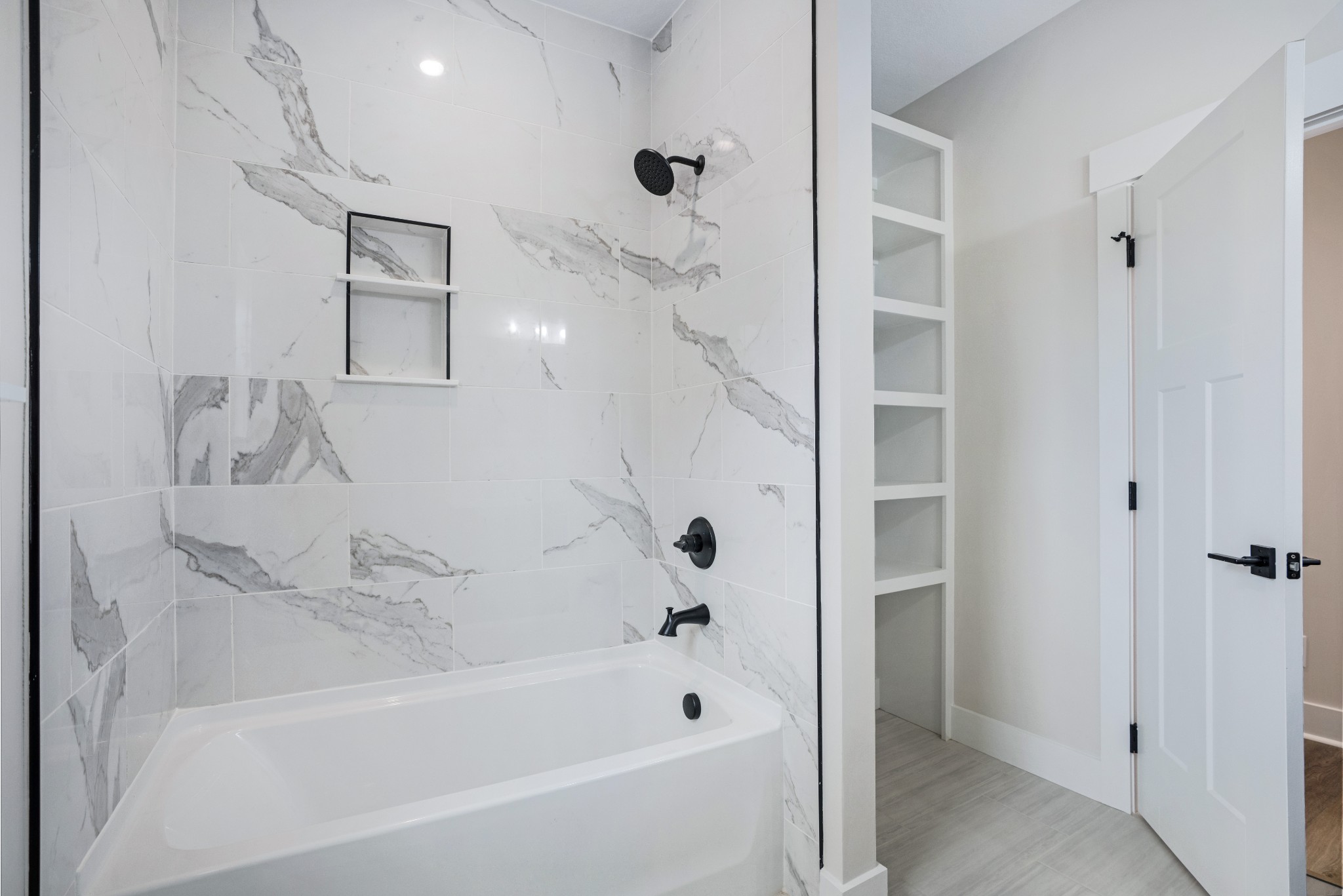 2615 Cooper Creek Road Woodlawn, TN 37191 - Photo 27 of 30 a bathroom with a bathtub and shower