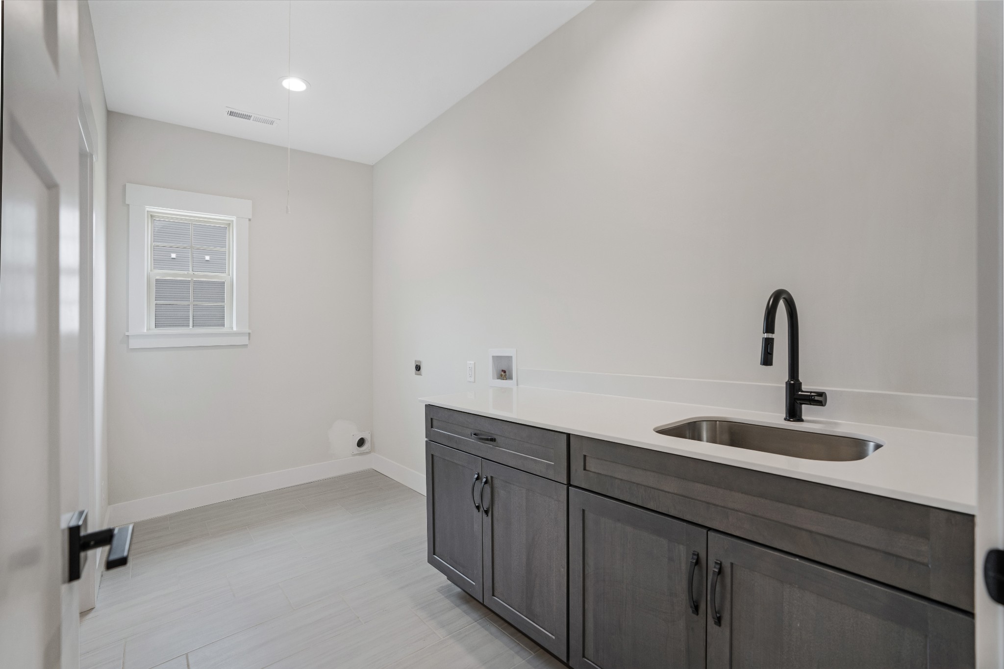 2615 Cooper Creek Road Woodlawn, TN 37191 - Photo 28 of 30 a kitchen with a sink and cabinets