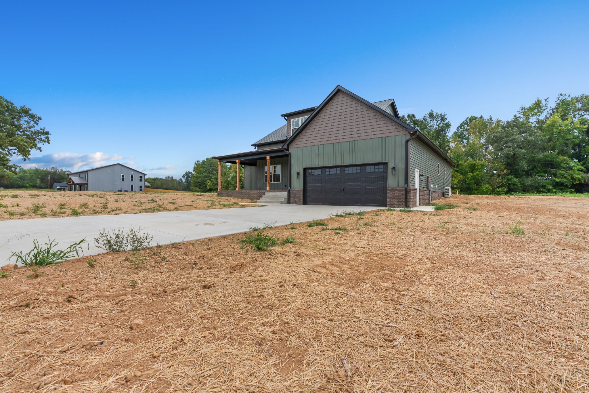 2615 Cooper Creek Road Woodlawn, TN 37191 - Photo 3 of 30 a view of the house with a yard